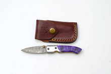 Load image into Gallery viewer, Titan International - Handmade Damascus AmethystEdge Folding Pocket Knife with Purple Resin Handle &amp; Leather Sheath | EDC Camping &amp; Hunting Knife