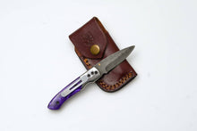 Load image into Gallery viewer, Titan International - Handmade Damascus AmethystEdge Folding Pocket Knife with Purple Resin Handle &amp; Leather Sheath | EDC Camping &amp; Hunting Knife